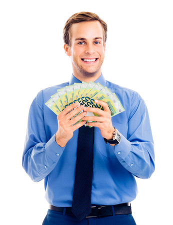 Portrait of businessman holding money euro cash banknotes, isolated against white background....