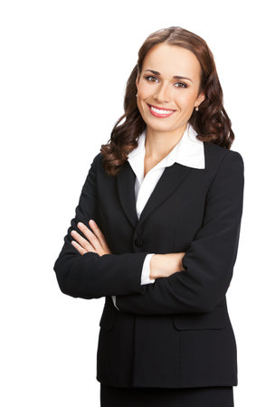 Portrait image of happy smiling young business woman standing in crossed arms pose, black confident suit, isolated on white background. Female executive office worker, teacher or real estate agent.の写真素材