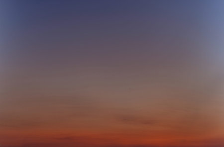 evening sunset sky with red, orange and purple sunlight. Golden hour after sunset
