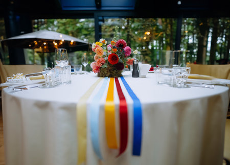 venue for a wedding reception with decor, selective focus on tables and decorの写真素材