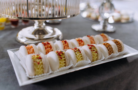 French macarons for sale. sweet macaroons in a plateの写真素材