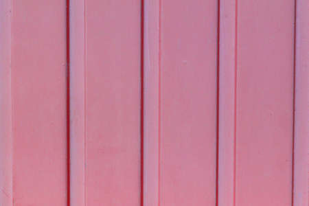 Pink background with vertical linesの写真素材