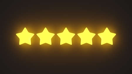 Glowing yellow five star rating on a black background.の写真素材
