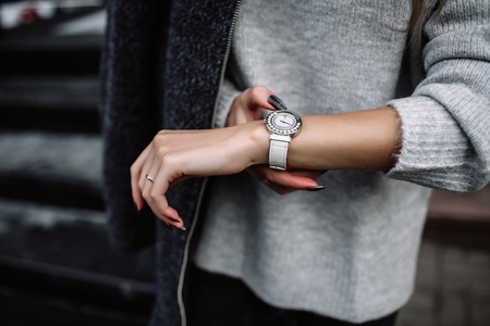 white women's wrist watch on the girl's handの写真素材