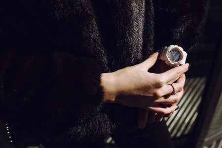 white women's wrist watch on the girl's handの写真素材