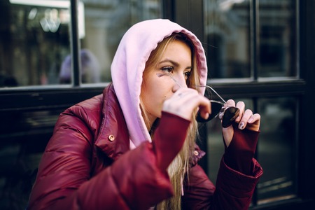 Stylish hipster girl in the retro jeans suitの写真素材