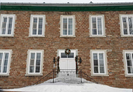 Quebec, Canada, April 16, 2019: Christmas decorated house facadeのeditorial素材