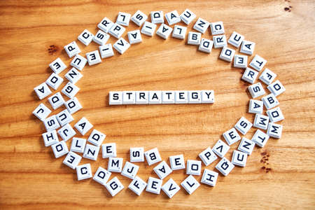 Buenos Aires, Argentina, September 28, 2020: Strategy word concept written on a wooden backgroundのeditorial素材