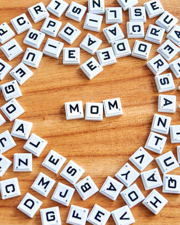 Buenos Aires, Argentina, September 28, 2020: Mom word concept written on a wooden backgroundのeditorial素材