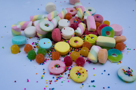 gummies and candies on white background