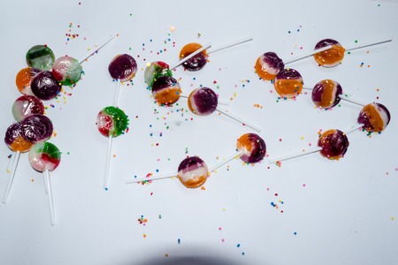 kissing sign with sweet lollipopsの写真素材