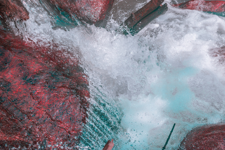 small waterfall in the foregroundの写真素材