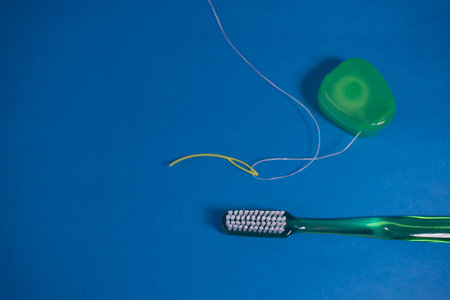 AERIAL VIEW OF TOOLS FOR ORAL CARE AND HYGIENE AND ORTHODONTIC CARE