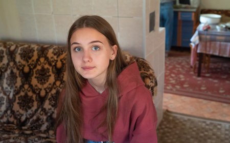 Cute Blue eyed girl looks in camera