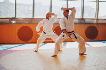 Mans on tatami trainings fighting stancesの写真素材