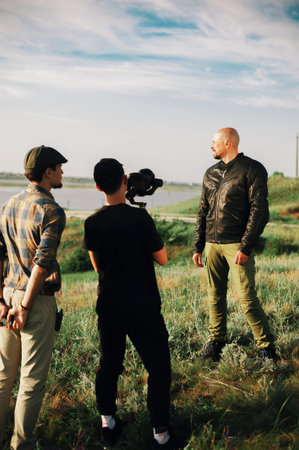Filming crew shoots bold man on valley