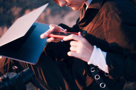 Stylish girl check her phoneの写真素材