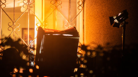 The warm light in front of window at nightの写真素材