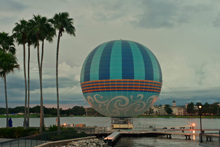 Orlando, Florida; September 23, 2018 Palms, hot air balloon and sunset skyline, in Lake Buena Vista.