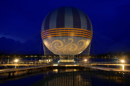 Orlando, Florida; August 19, 2018 Beatiful sky blue and illuminated air balloon at Lake Buena Vista