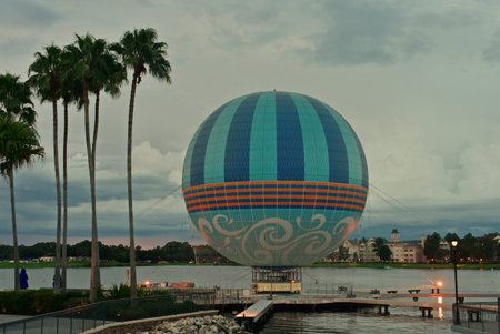 Orlando, Florida; August 23, 2018 Palms, hot air balloon and sunset skyline, in Lake Buena Vista.
