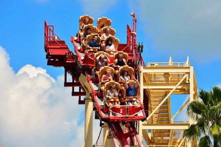 Orlando, Florida; August 13, 2018 Roller coaster with fanny riders, at Universal Studios.のeditorial素材
