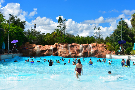 Orlando, Florida. October 26, 2018. Beautiful lightblue pool with waterfalls and waves at Water Park in International Drive area.のeditorial素材