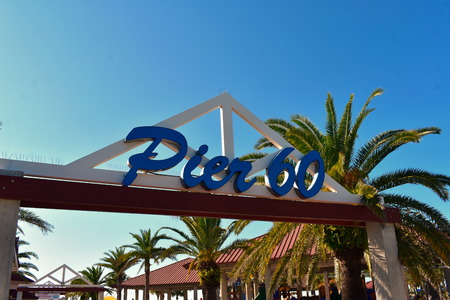 Clearwater, Florida. October 18, 2018. Top view of Pier 60 sign at Clearwater Beach.のeditorial素材