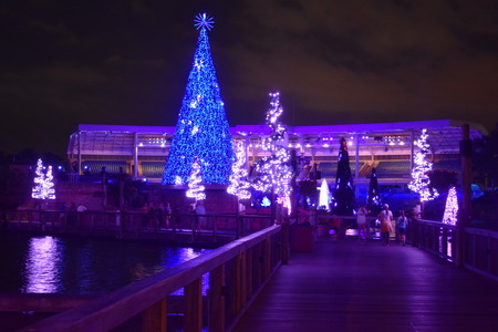 Orlando, Florida. November 20, 2018. Bridge and illuminated Christmas Trees on colorful stadium background in International Drive area.のeditorial素材