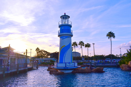 Orlando, Florida. November 19, 2018. Seaworld lighthouse on sunset background in International Drive area.のeditorial素材