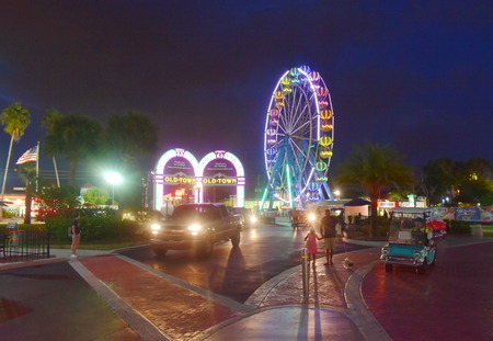 Orlando, Florida. November 02, 2018. Main entrance of Old Town with arches and colorful wheel in Kissimmee area.のeditorial素材