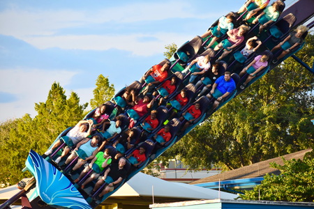 Orlando, Florida. November 19, 2018. Nice families and friends enjoying rollercoaster ride in International Drive area.のeditorial素材