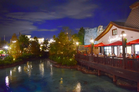 Orlando, Florida. November 24, 2018 Panoramic view of colorful restaurant and pines on the side of the lake in Lake Buena Vistaのeditorial素材