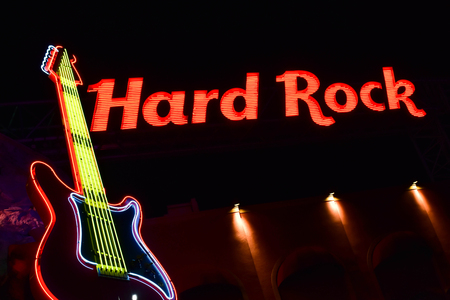 Orlando, Florida. February 05, 2019. Hard Rock illuminated sign and colorful guitar in Citywalk at Universal Studios area.のeditorial素材