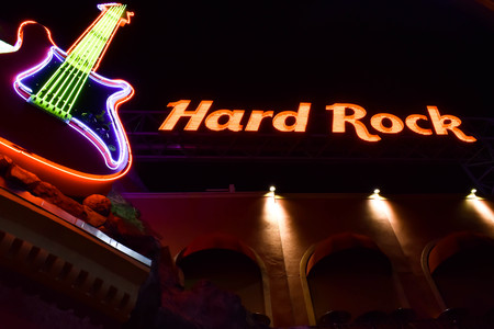 Orlando, Florida. February 06, 2019. Hard Rock illuminated sign and colorful guitar in Citywalk at Universal Studios area.のeditorial素材