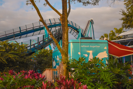 Orlando, Florida. March 09 2019. Coca Cola trailer and Mako rollercoaster at Seaworld in International Drive area.のeditorial素材