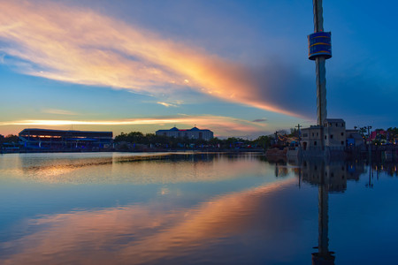 Orlando, Florida. March 09 2019. Bayside Stadium, Sky Tower and blue lagoon on colorful sunset background at Seaworld in International Drive area (3)のeditorial素材