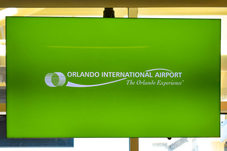 Orlando, Florida. March 01, 2019. Orlando Airport green sign at Orlando International Airport.のeditorial素材
