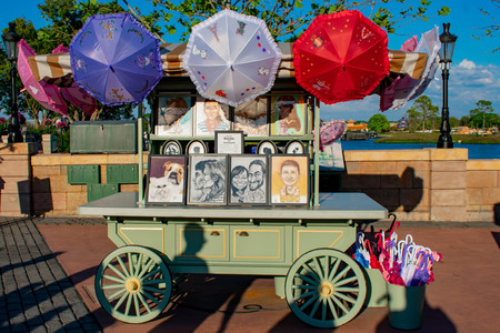 Orlando, Florida . March 27, 2019. Portraits designed with a pencil and colorful umbrellas at France Pavilion at Epcot in Walt Disney World.のeditorial素材
