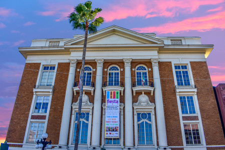 Ybor City Tampa Bay, Florida. January 19, 2019 Old Italian Life Club on 7th Ave on colorful sky background.のeditorial素材