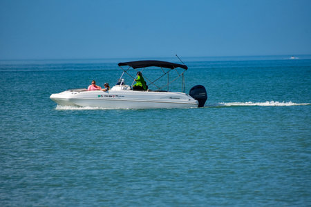 Clearwater Beach, Florida. January 25, 2019 People enjoying bowrider boat close to Clearwater Marine...