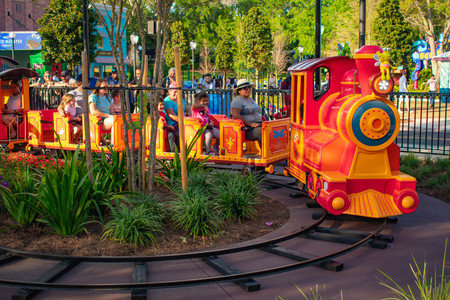 Orlando, Florida. April 7, 2019. Parent and Kids enjoying colorfur Elmos Choo Choo Train at Seaworld in International Drive area (1)のeditorial素材