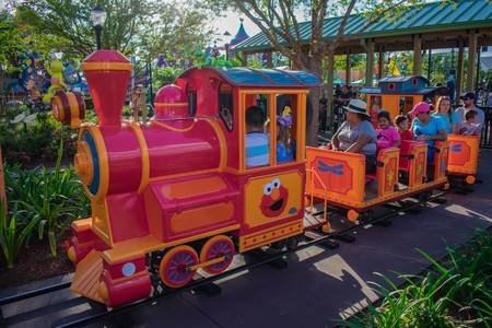 Orlando, Florida. April 7, 2019. Parent and Kids enjoying colorfur Elmos Choo Choo Train at Seaworld in International Drive area (3)のeditorial素材