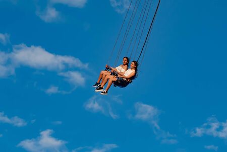 Orlando, Florida. May 16, 2019. People enjoying Orlando Star Flyer. It is the? World? S tallest swing ride standing at 450 feet. in International Drive area (14)のeditorial素材