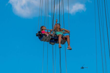 Orlando, Florida. May 16, 2019. People enjoying Orlando Star Flyer. It is the? World? S tallest swing ride standing at 450 feet. in International Drive area (15)のeditorial素材