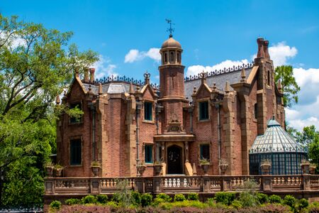 Orlando, Florida. May 16, 2019. Haunted Mansion on lightblue cloudy sky background in Magic Kingdom at Walt Disney World Resort (2)のeditorial素材