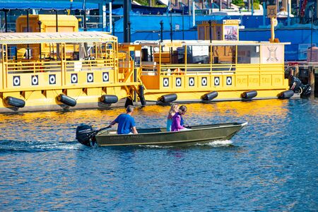 Tampa Bay, Florida. April 28, 2019. People sailing on bay boat on Hillsborough River and colorful water taxis (2)のeditorial素材