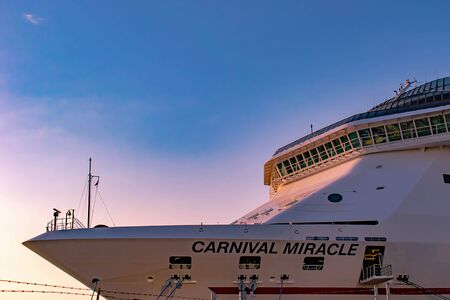 Tampa Bay, Florida. April 28, 2019. Prow of Carnival Miracle on sunrise background.のeditorial素材