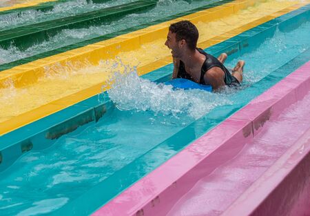 Orlando, Florida. July 01, 2019. Man enjoying amazing Tamauta Racer attraction at Aquatica 2のeditorial素材