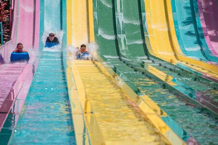 Orlando, Florida. July 01, 2019. People sliding down to staggeringly steep hill in Tamauta Racer at Aquatica 4のeditorial素材